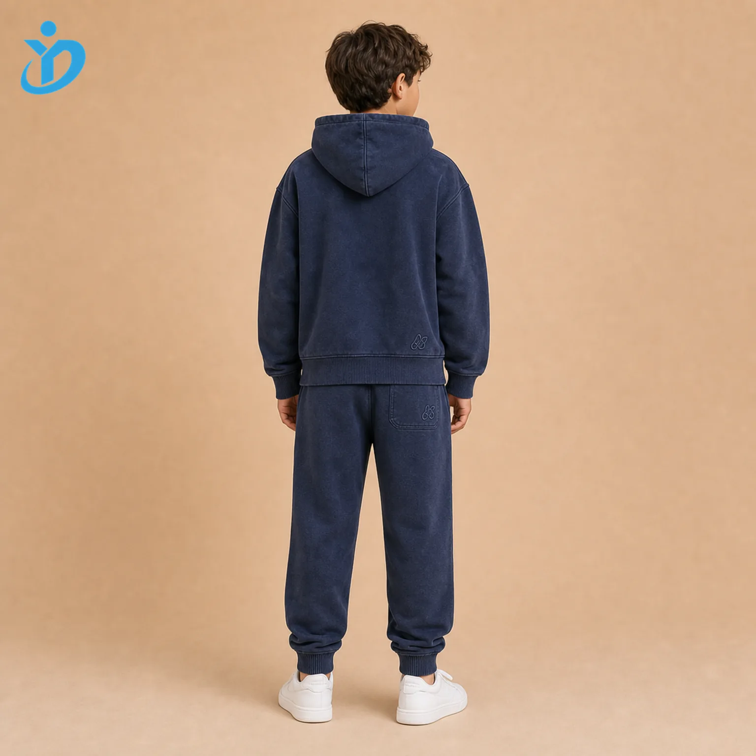 Custom boys embroidered tracksuit set back view with washed navy hoodie, jogger pants, rib cuffs, garment wash soft hand feel and Dongguan Yidi Clothing Co Ltd transparent logo.
