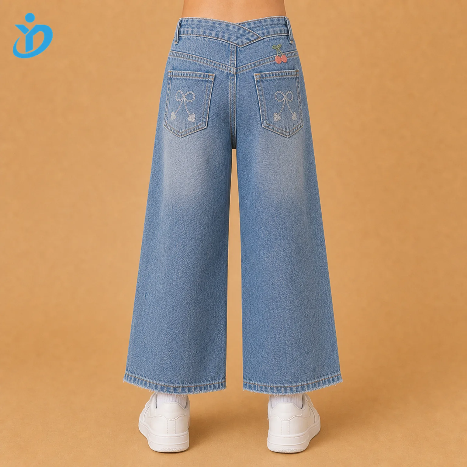 Lower body back view of custom girls wide leg denim jeans with embroidered back pockets, vintage medium blue snow wash, wide leg fit and Dongguan Yidi Clothing Co Ltd transparent logo