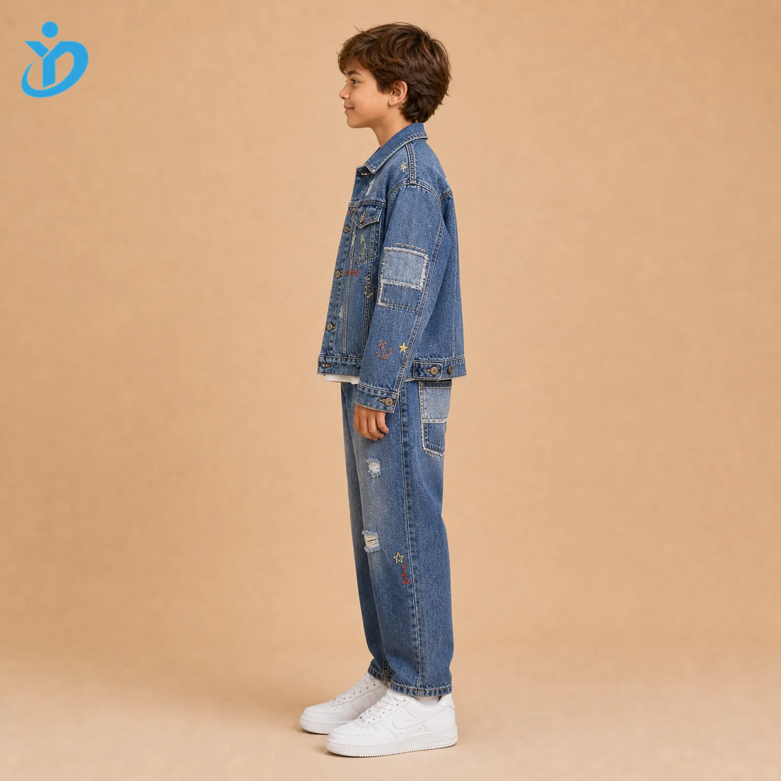 Custom kids distressed patchwork denim set side view with patchwork denim panels, repaired rips