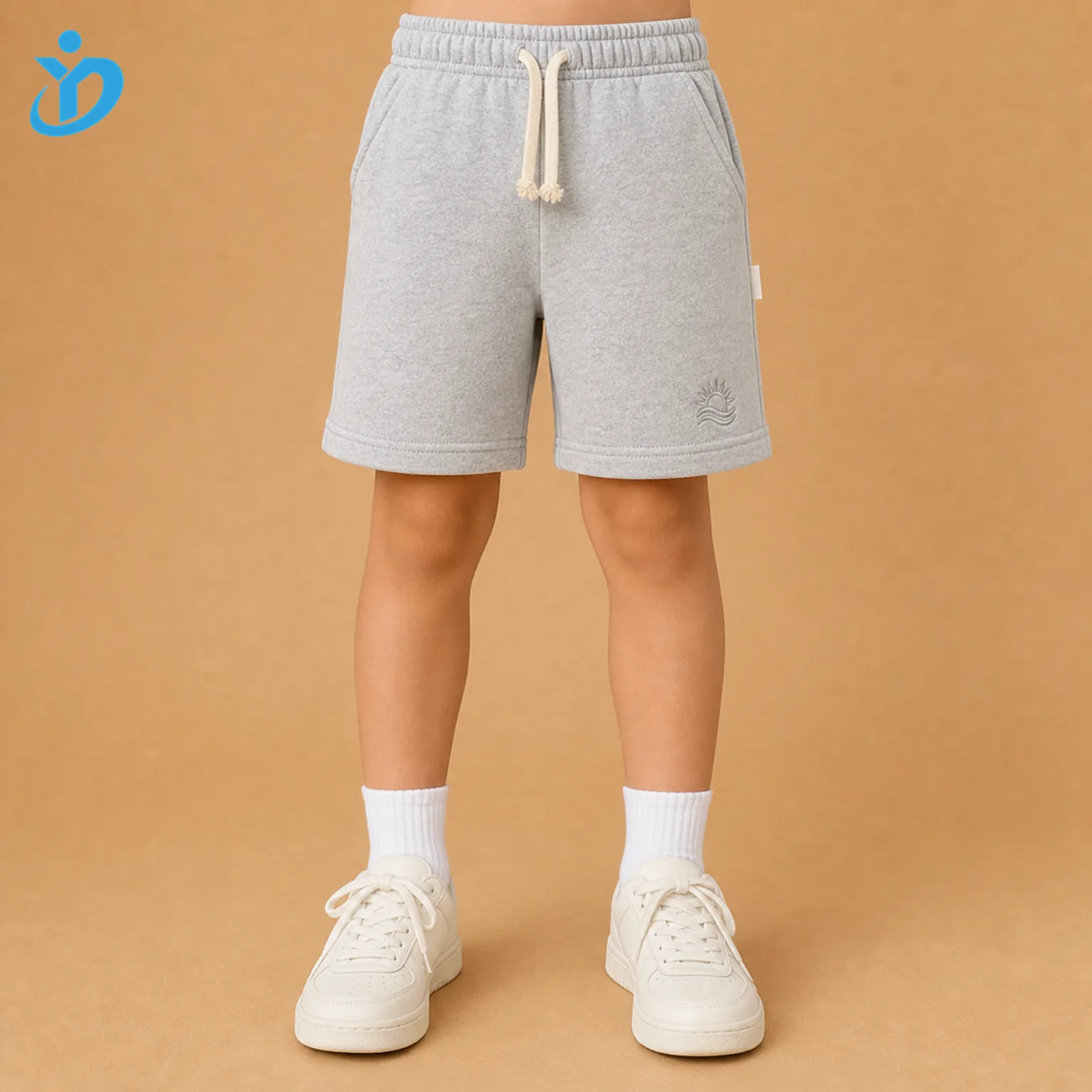 Lower body front view of custom kids French terry shorts with light heather gray fabric, elastic waistband, cream drawcord, tonal embroidery, woven side label and Dongguan Yidi Clothing Co Ltd transparent logo