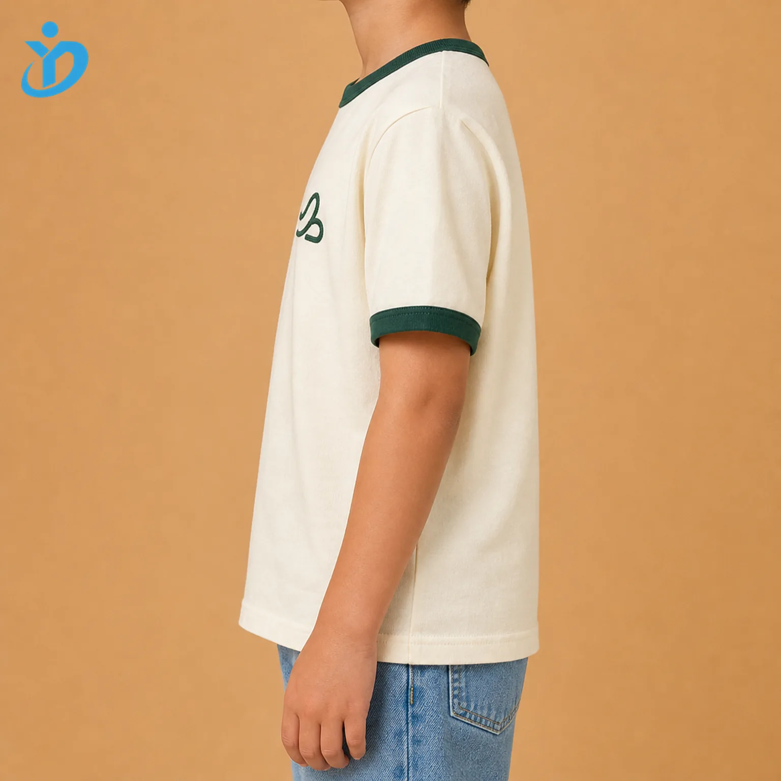 Upper body side view of custom kids ringer T shirt showing cream body forest green sleeve cuff contrast collar chain stitch embroidery edge retro boys girls fit and Dongguan Yidi Clothing Co Ltd transparent logo