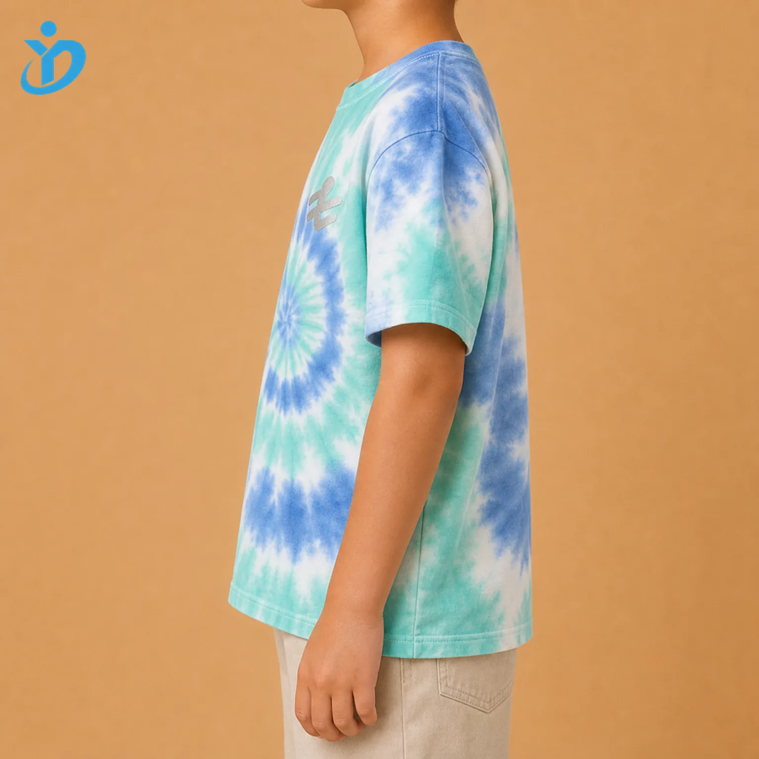 Upper body side view of custom kids tie dye T shirt showing blue aqua mint white tie dye pattern reflective print edge soft cotton jersey and Dongguan Yidi Clothing Co Ltd transparent logo