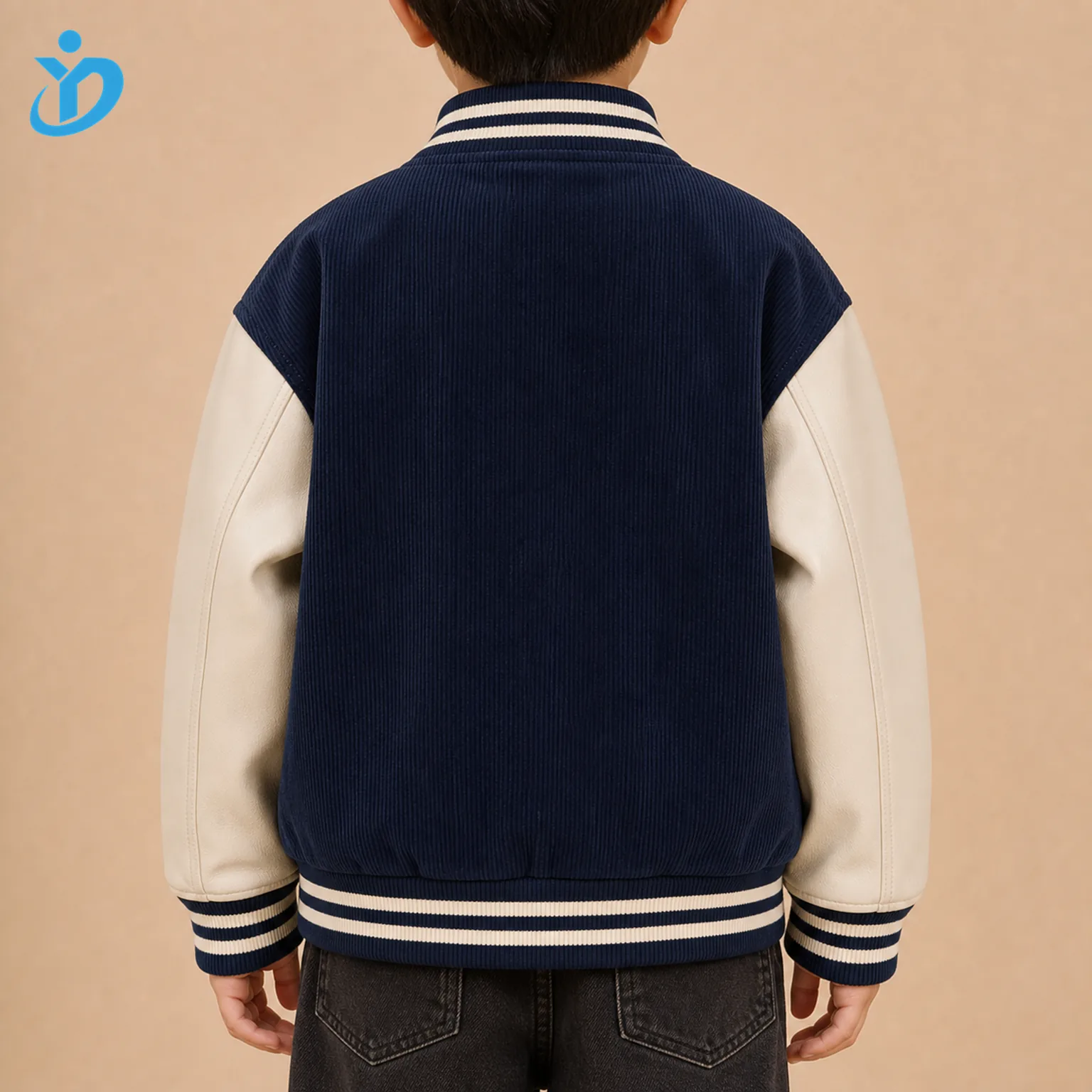 Upper body back view of custom kids varsity bomber jacket with navy corduroy-look body, cream PU-look sleeves, ribbed trims, relaxed kids fit and Dongguan Yidi Clothing Co Ltd transparent logo