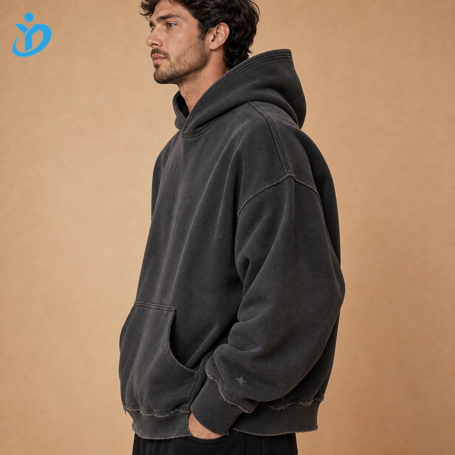 Upper body side view of custom mens boxy vintage washed hoodies showing ultra dropped shoulder cropped wide body double-layer hood exposed stitching localized fading and Dongguan Yidi Clothing Co Ltd transparent logo