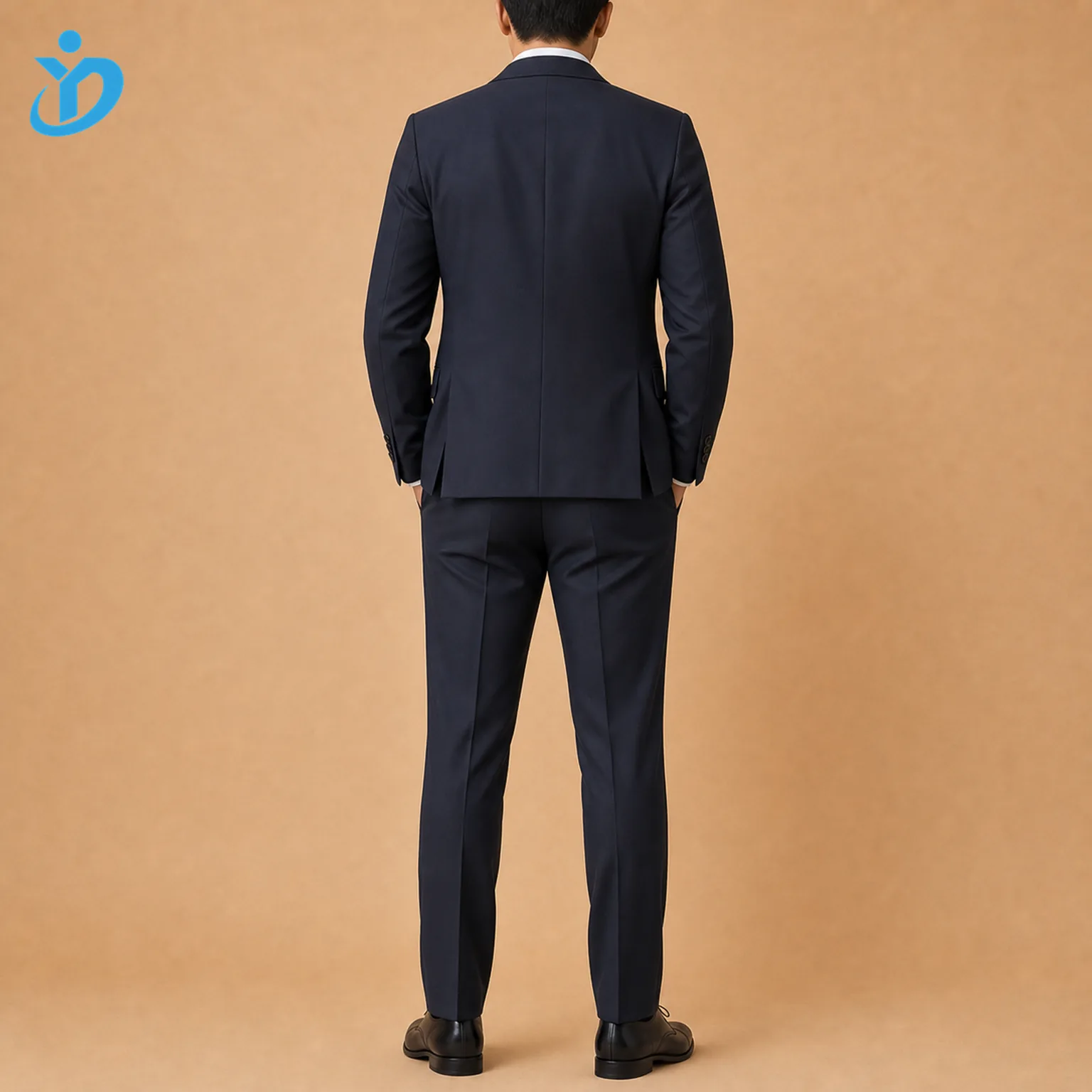 Full body back view of custom mens double breasted suit with deep navy tailored jacket double vents natural shoulder high waist trousers black dress shoes and Dongguan Yidi Clothing Co Ltd transparent logo