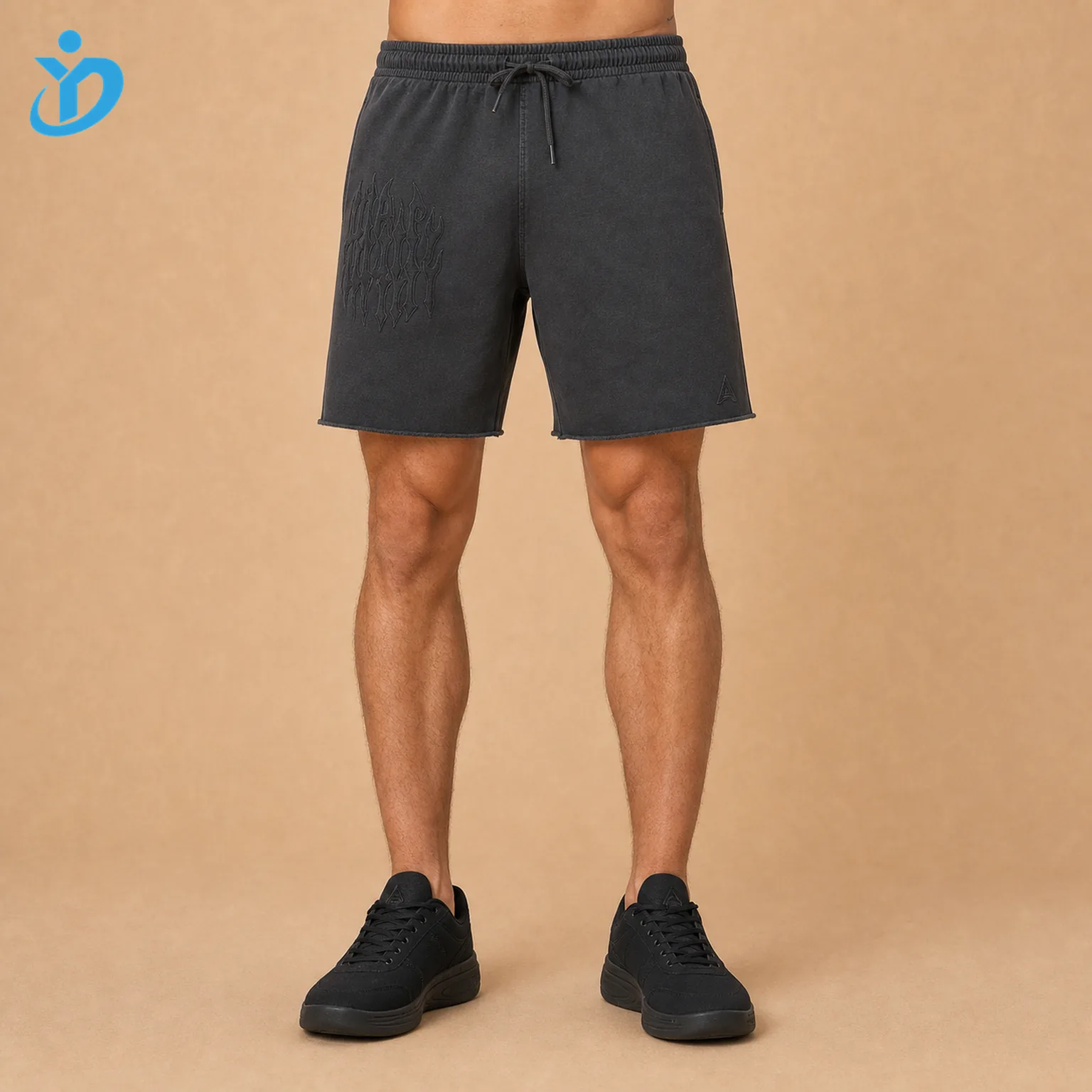 Lower body front view of custom mens French Terry sweat shorts in garment dyed faded charcoal heavyweight cotton with elastic waist drawcord raw edge hem puff print embroidery logo and Dongguan Yidi Clothing Co Ltd transparent logo