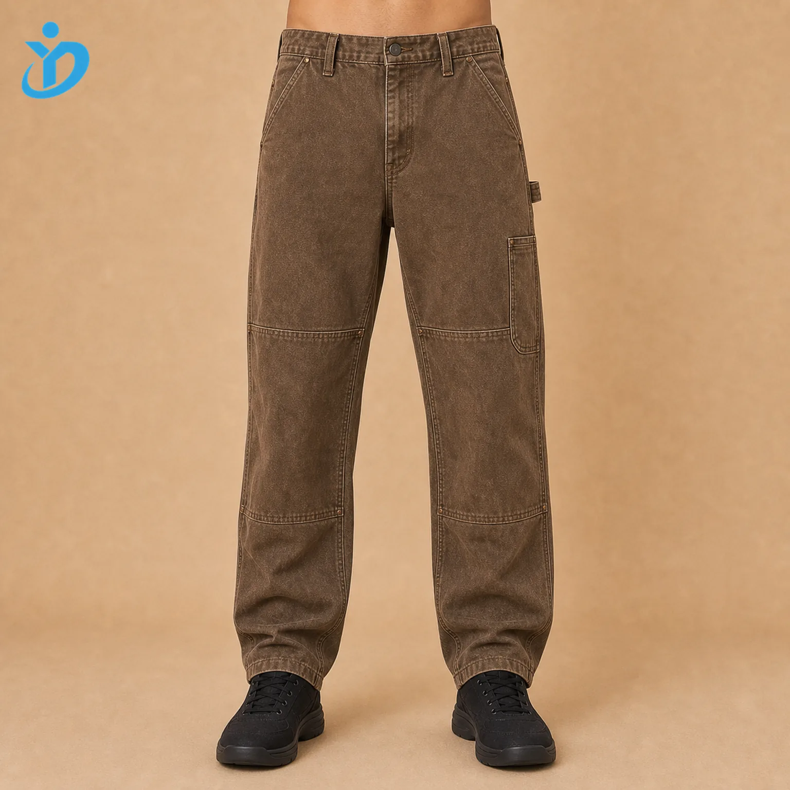 Lower body front view of custom mens garment dyed carpenter pants in vintage washed tobacco brown heavy canvas with double knee hammer loop utility pocket reinforced stitching and Dongguan Yidi Clothing Co Ltd transparent logo