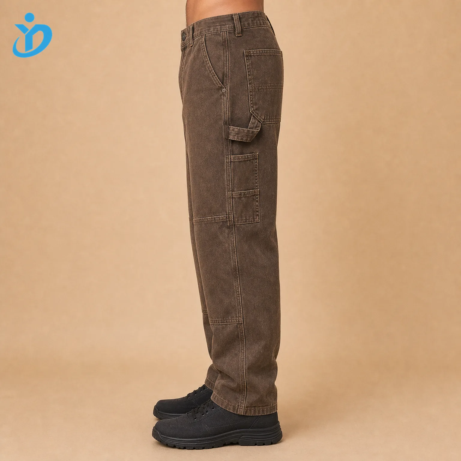 Lower body side view of custom mens heavy canvas carpenter pants showing hammer loop utility pocket double knee panel garment dye vintage wash reinforced stitching and Dongguan Yidi Clothing Co Ltd transparent logo