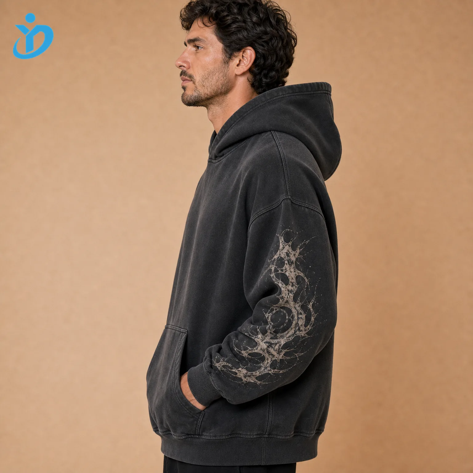 Upper body side view of custom mens heavyweight pullover hoodies showing dropped shoulder three-piece hood kangaroo pocket heavy fleece and sleeve print with Dongguan Yidi Clothing Co Ltd transparent logo