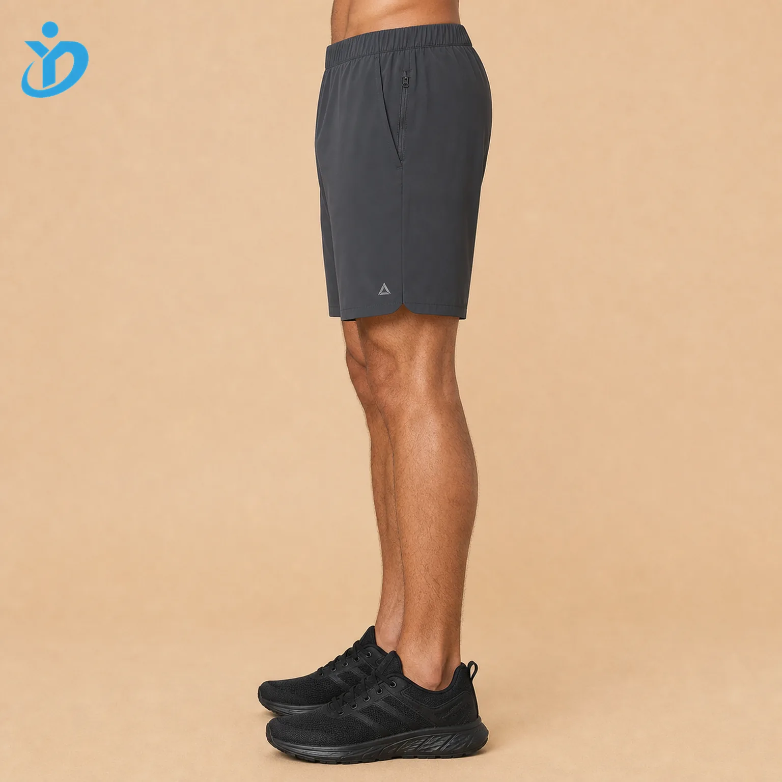 Lower body side view of custom mens hybrid shorts showing water resistant lightweight stretch fabric hidden zip pocket elastic waistband streamlined sports fit and Dongguan Yidi Clothing Co Ltd transparent logo