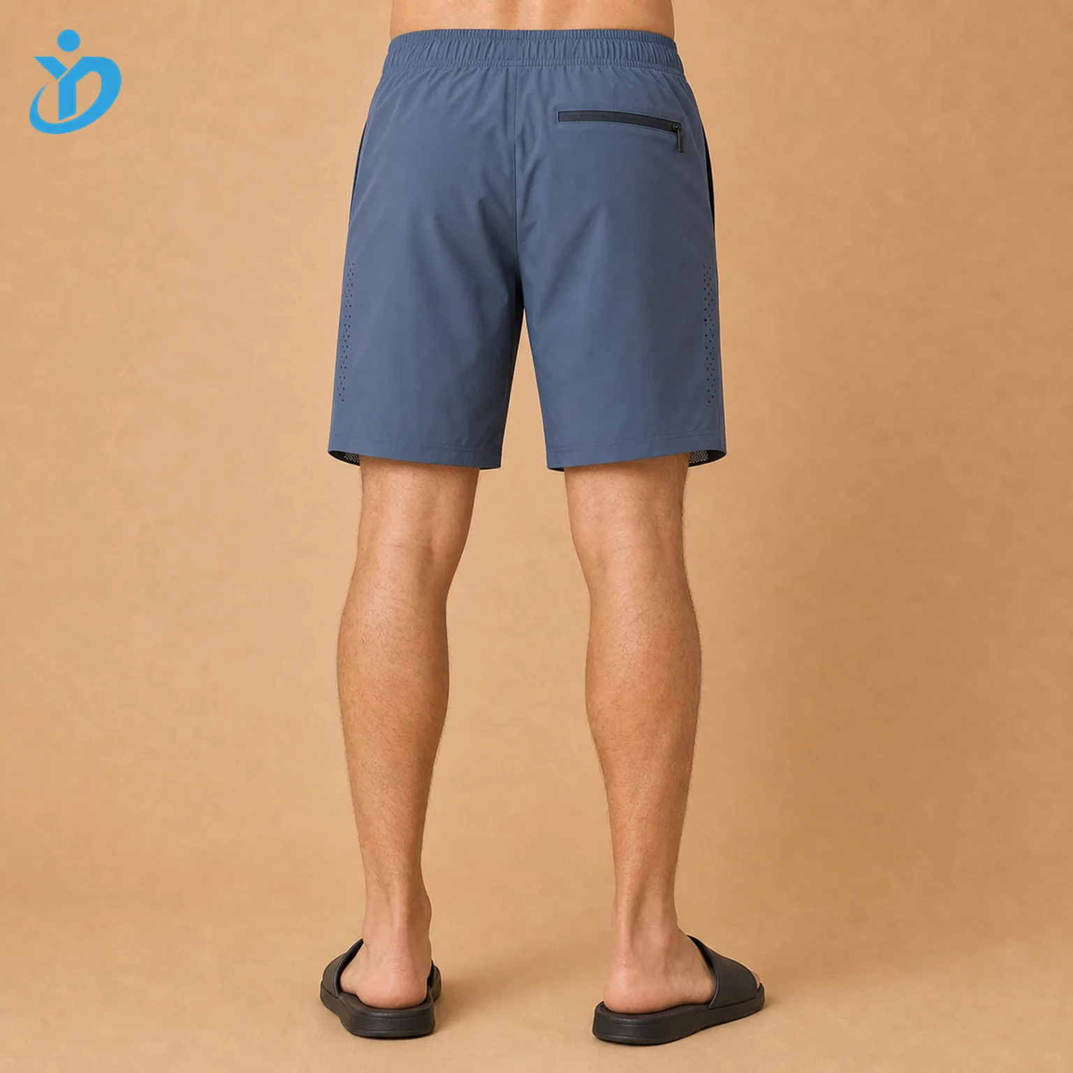 Lower body back view of custom mens hybrid swim shorts with elastic waistband quick dry water repellent fabric back pocket laser ventilation details and Dongguan Yidi Clothing Co Ltd transparent logo