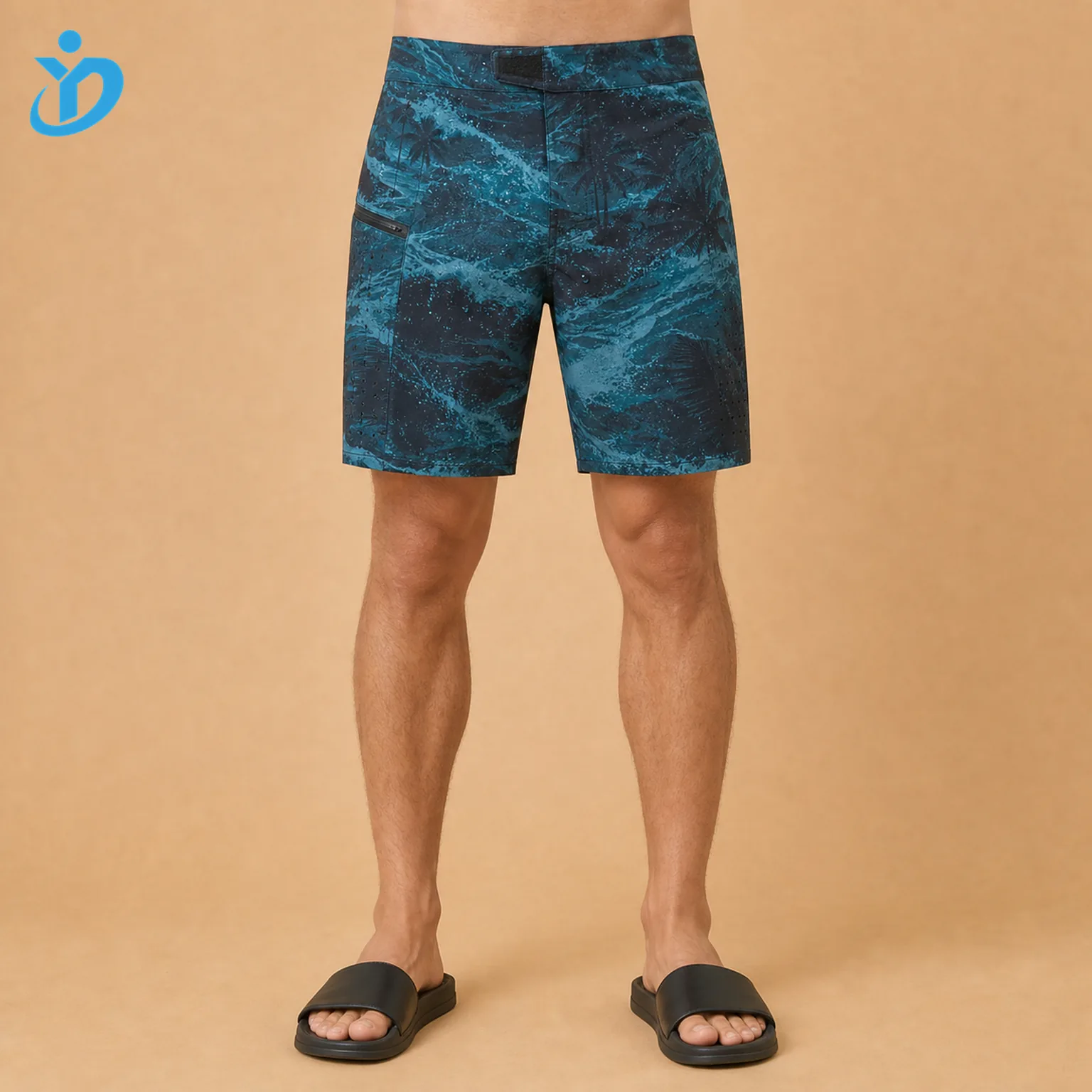 Lower body front view of custom mens quick dry board shorts with 4 way stretch teal navy digital print DWR water repellent finish Velcro fly laser perforation and Dongguan Yidi Clothing Co Ltd transparent logo