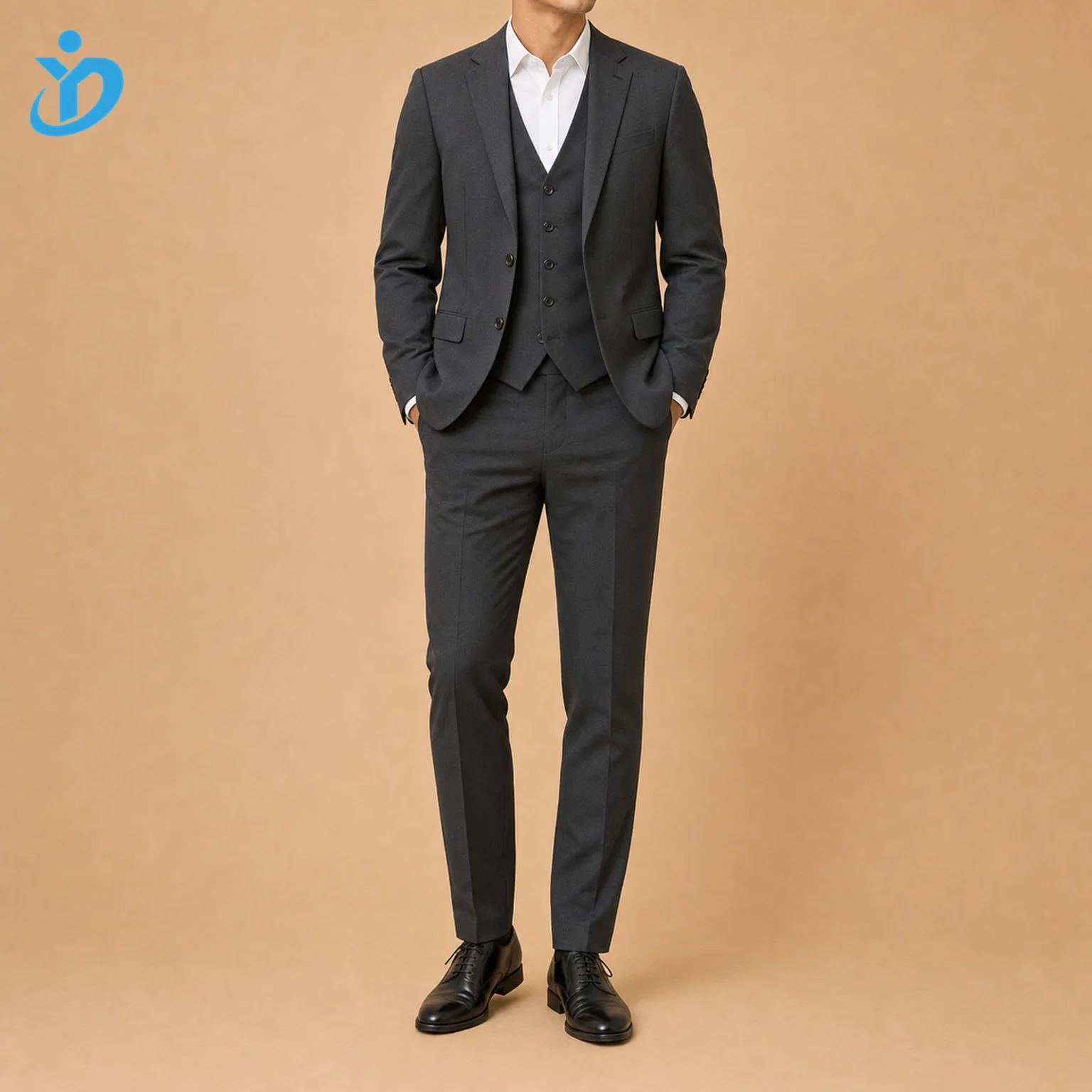 Full body front view of custom mens three piece wedding suit with dark charcoal single breasted two button jacket five button matching waistcoat flat front trousers slim fit black shoes and Dongguan Yidi Clothing Co Ltd transparent logo