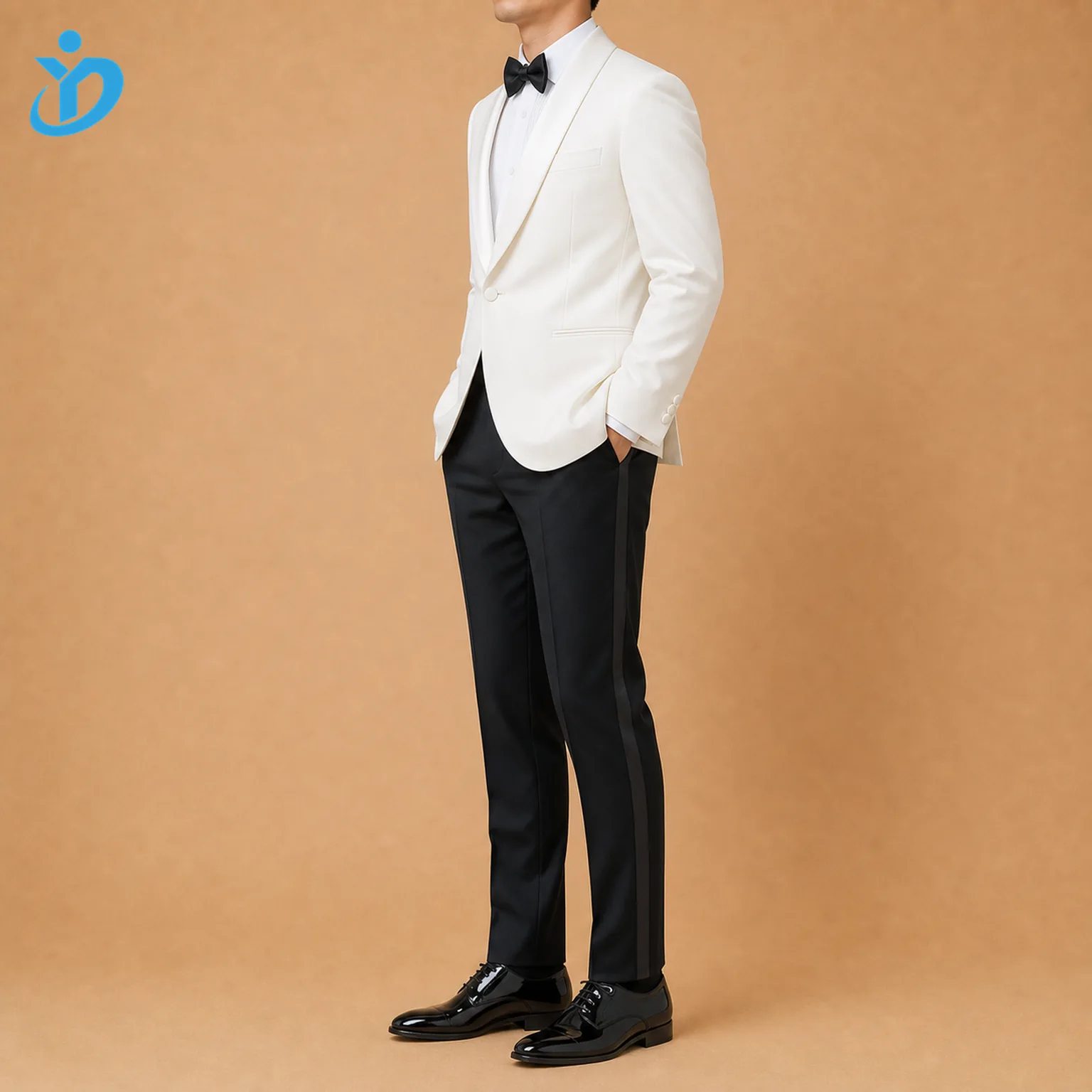 Full body side view of custom mens tuxedo dinner suit showing ivory white dinner jacket satin lapel black formal trousers satin side stripe side adjusters patent shoes and Dongguan Yidi Clothing Co Ltd transparent logo