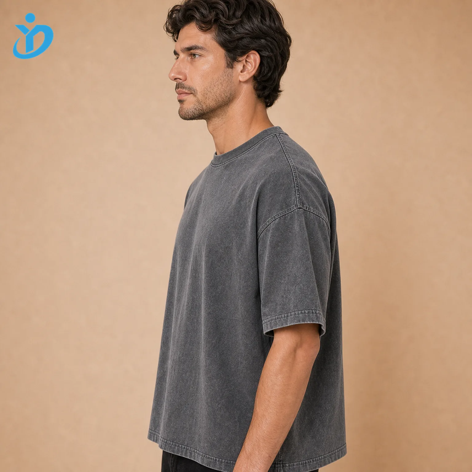 Upper body side view of custom mens vintage washed T-shirts showing boxy fit dropped shoulder stone wash vintage grey cotton jersey and Dongguan Yidi Clothing Co Ltd transparent logo