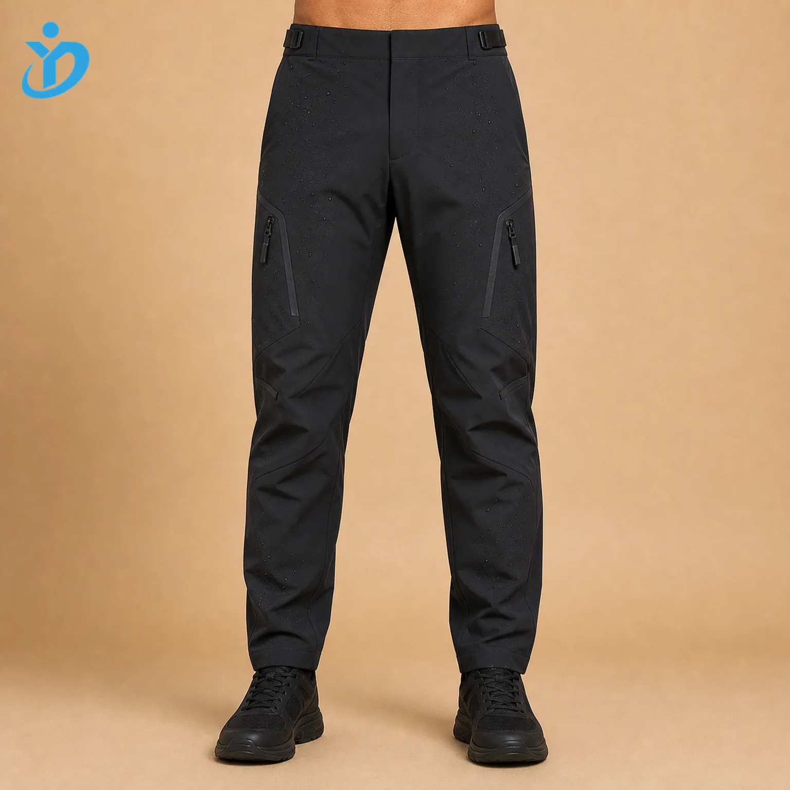 Lower body front view of custom mens matte black nylon spandex waterproof techwear pants with water resistant finish laser cutting bonded seams waterproof zippers adjustable waist and Dongguan Yidi Clothing Co Ltd transparent logo