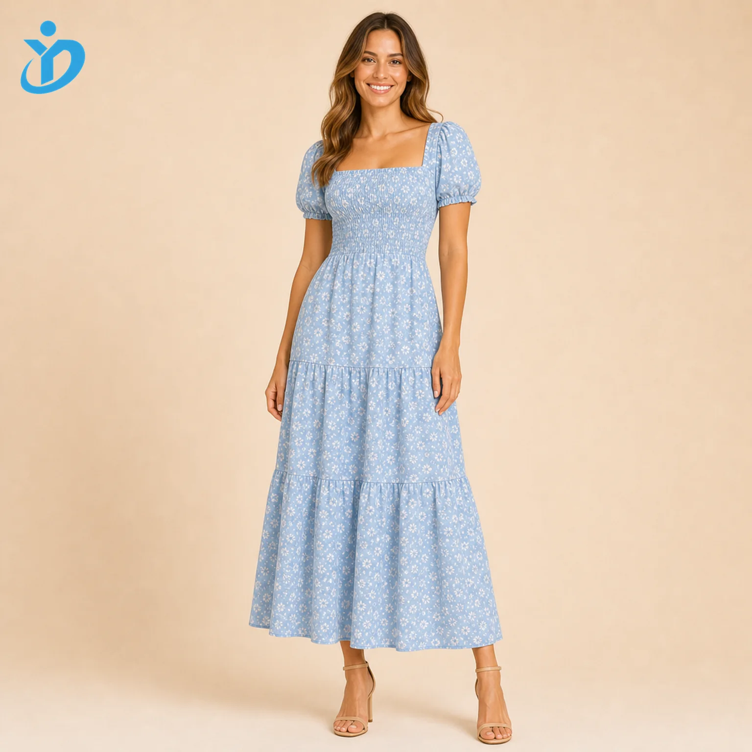 Custom womens blue floral tiered dress front view on real female model with smocked bodice puff sleeves tiered maxi skirt and Dongguan Yidi Clothing Co Ltd transparent logo