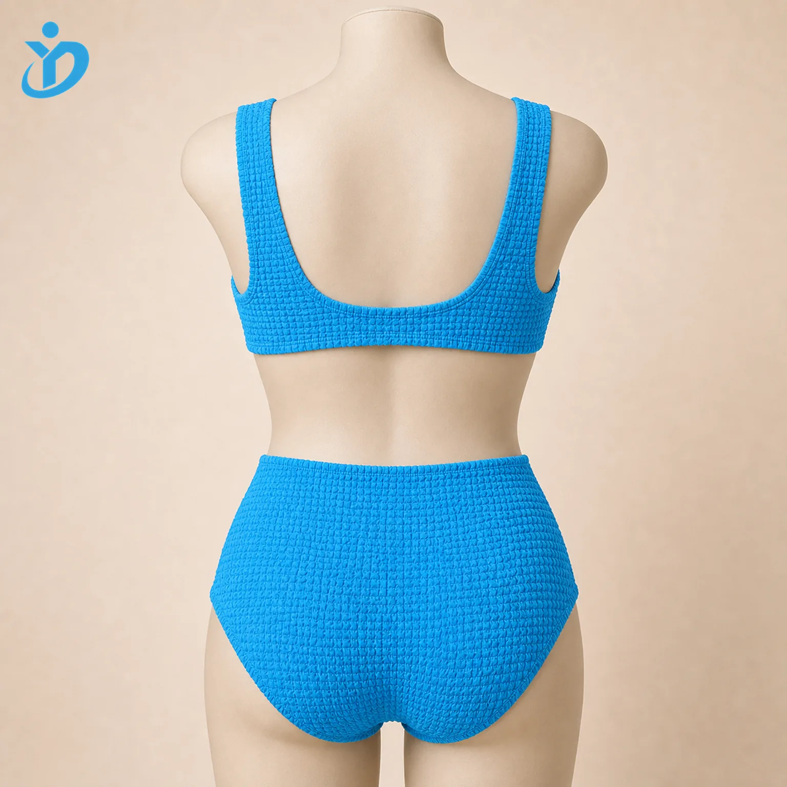 Custom womens crinkle bubble texture bikini set back view on mannequin showing soft crinkle fabric high waist bottom and Dongguan Yidi Clothing Co Ltd transparent logo