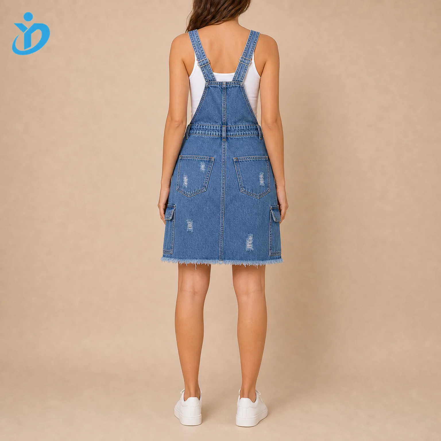 Custom womens distressed denim overall dress back view showing adjustable straps relaxed fit cargo pocket edges distressed details raw hem and Dongguan Yidi Clothing Co Ltd transparent logo