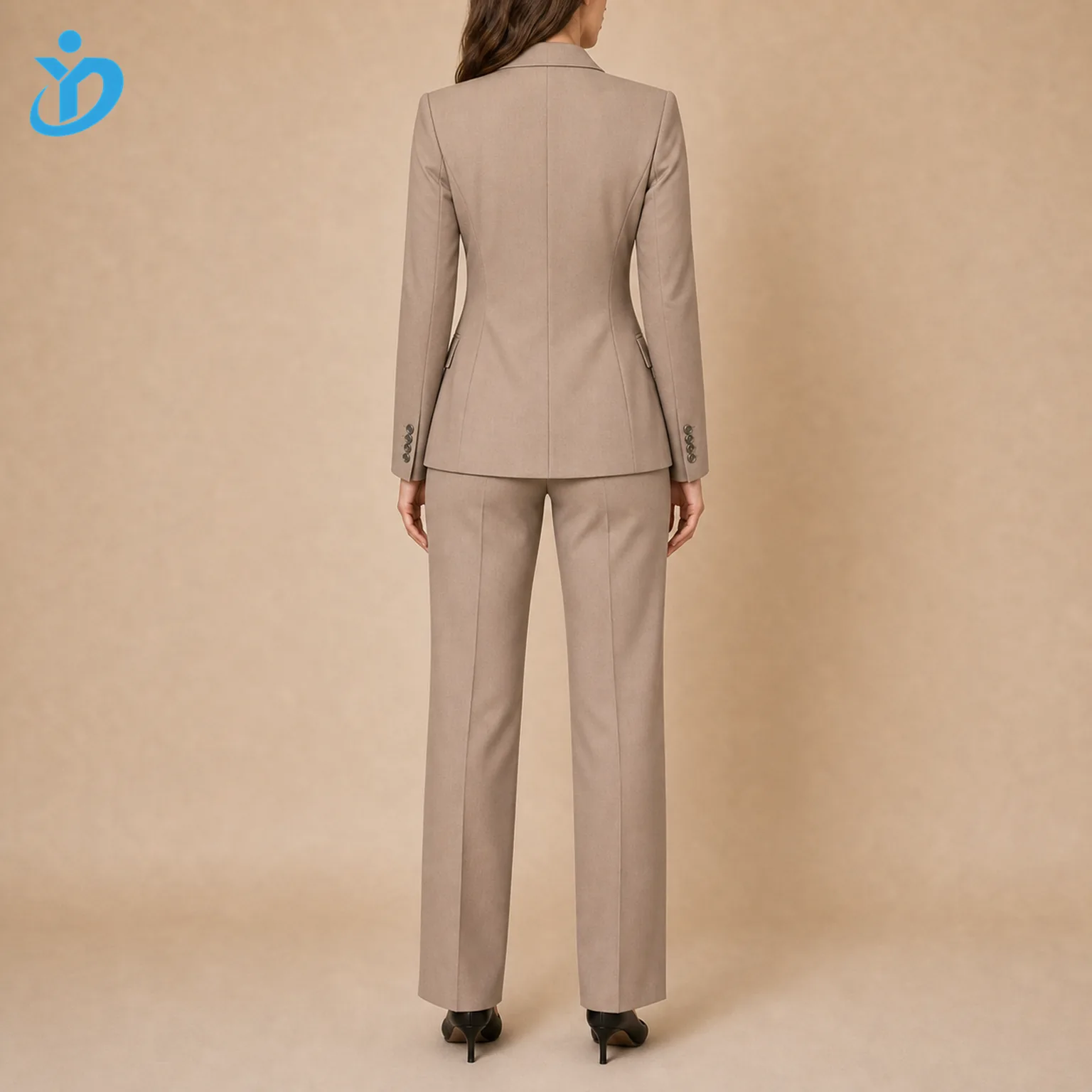 Custom womens double breasted suit sets back view showing structured blazer back high waist trousers slim but not tight corporate business fit black heels and Dongguan Yidi Clothing Co Ltd transparent logo