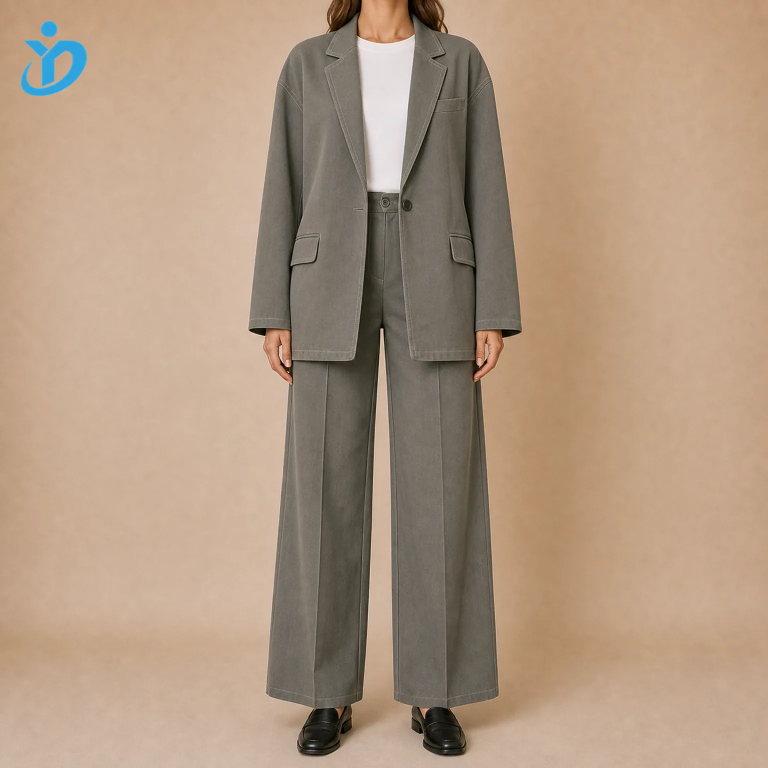 Custom womens oversized blazer sets front view with drop shoulder boyfriend fit garment washed blazer wide leg pants white top black loafers and Dongguan Yidi Clothing Co Ltd transparent logo