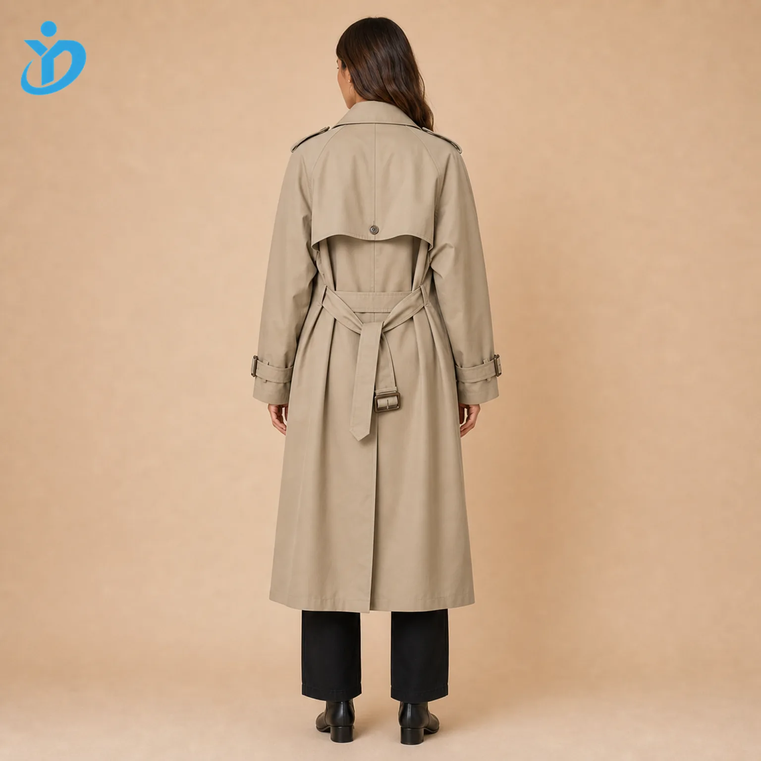 Custom womens oversized long trench coat back view showing long oversized silhouette back storm flap waist belt shoulder epaulettes water repellent coating and Dongguan Yidi Clothing Co Ltd transparent logo