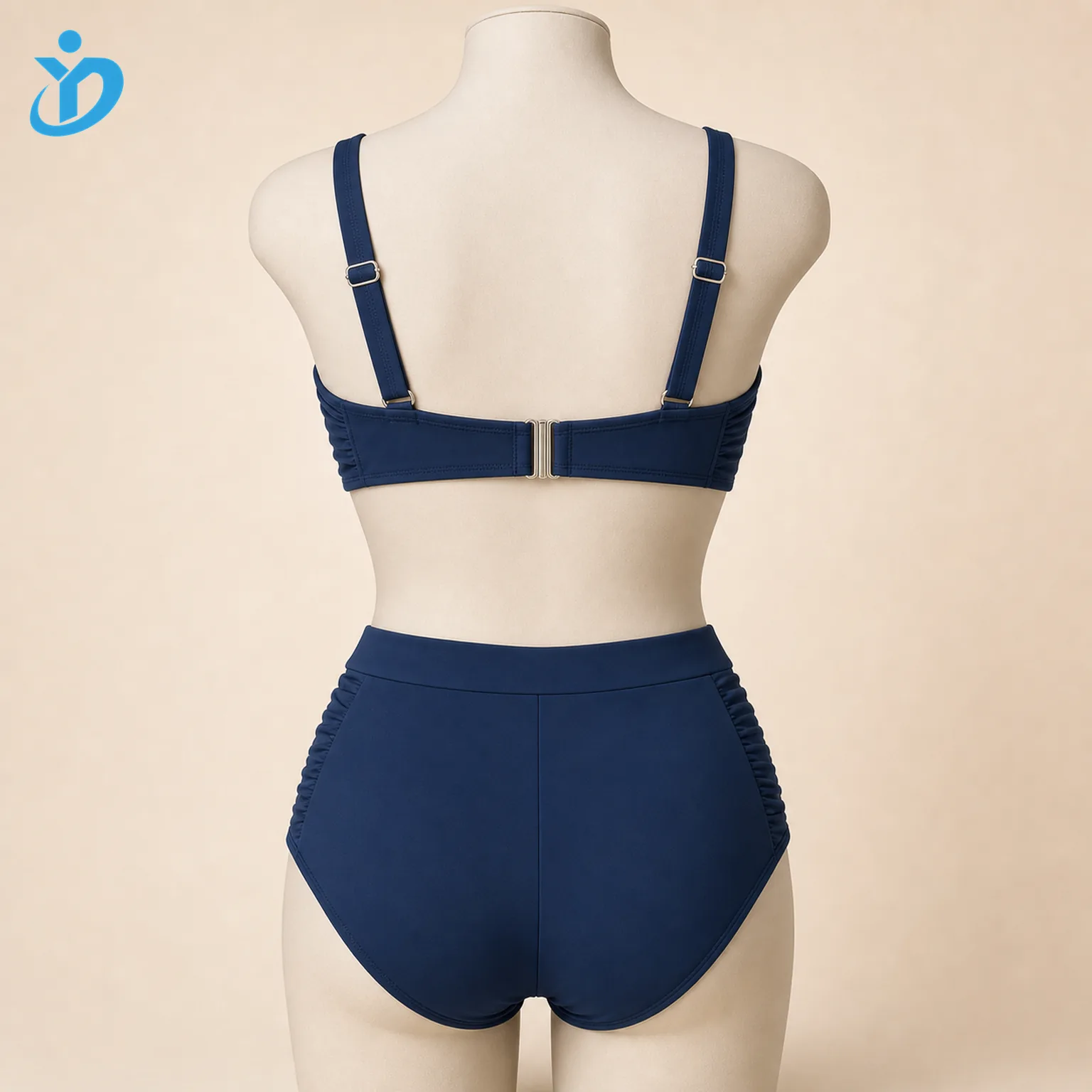 Custom womens underwire support bikini set back view on mannequin showing adjustable straps metal back clasp full coverage bottom and Dongguan Yidi Clothing Co Ltd transparent logo
